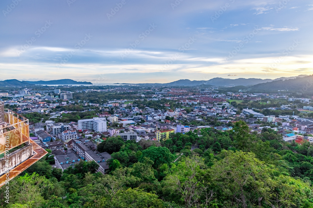 Panoramic view old phuket town viewed from Khaorang Hill and in the distance is Challong Bay and the islands big Buddha and Rawai Phuket Thailand