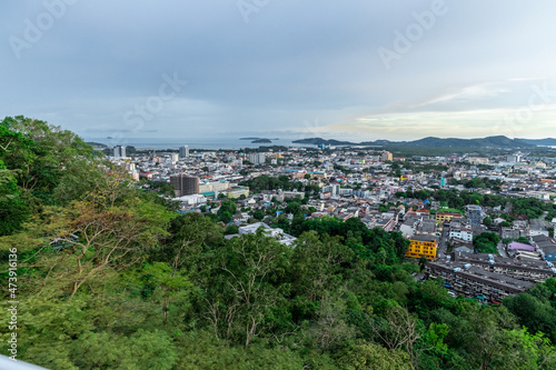 Panoramic view old phuket town viewed from Khaorang Hill and in the distance is Challong Bay and the islands big Buddha and Rawai Phuket Thailand