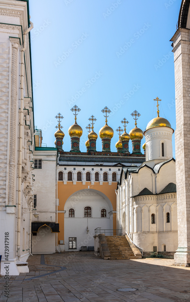 Golden domes of Upper Saviour Cathedral and Terem Churches at the Grand Kremlin Palace in Moscow.