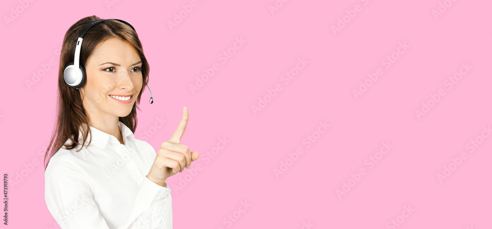 Call center service. Customer support female phone sales operator in white confident cloth, headset showing pointing clicking at copy space, imaginary or slogan text, over rose pink background. Call center service. Customer support female phone sales operator in white confident cloth, headset showing pointing clicking at copy space, imaginary or slogan text, over rose pink background.