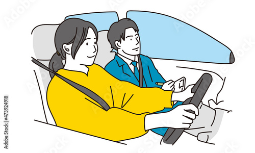車の運転の教習を受ける女性