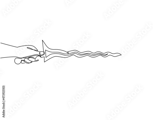 Single continuous line drawing hand holding keris traditional weapon from Indonesia. Javanese keris with its elaborately carved handle and wavy blade is unique. One line draw graphic design vector photo
