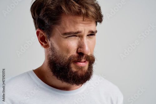 bearded man health problems migraine stress disorder isolated background