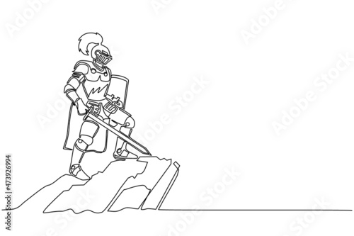 Single continuous line drawing medieval knight standing in armor, helmet holding shield and sword standing on top of mountain. Warrior of middle ages. One line draw graphic design vector illustration