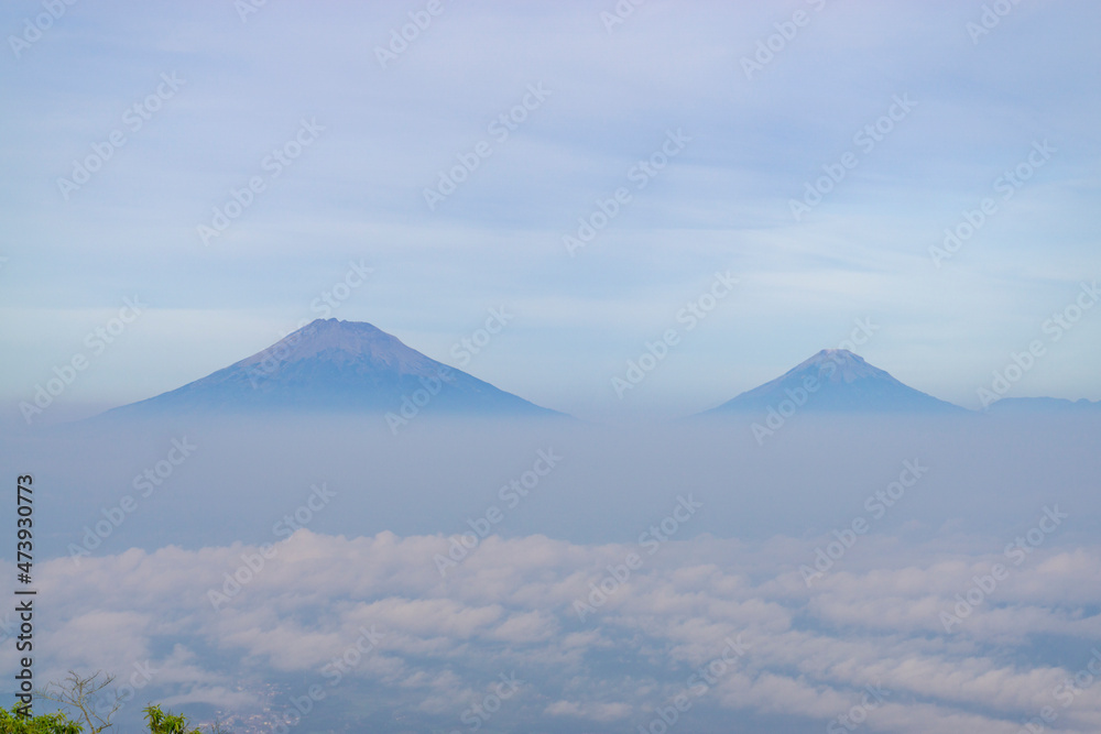 Fototapeta premium Landscape photo of mountain taken from highland with tree and bushes foreground . this is the view from top of Mount Telomoyo