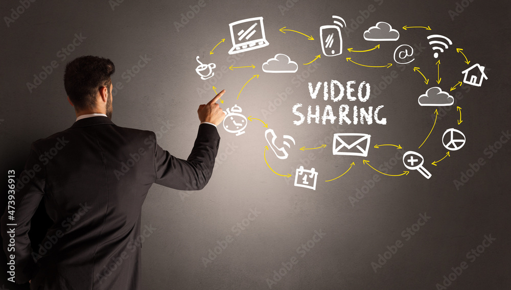 businessman drawing social media icons businessman drawing social media icons