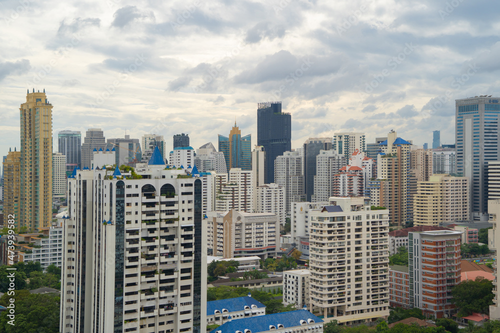 Fototapeta premium Aerial view of Bangkok Downtown Skyline, Thailand. Financial district and business centers in smart urban city in Asia. Skyscraper and high-rise buildings at sunset.