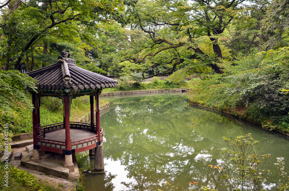 A Beautiful Korean Traditional Garden with gazebo and small lake A Beautiful Korean Traditional Garden with gazebo and small lake