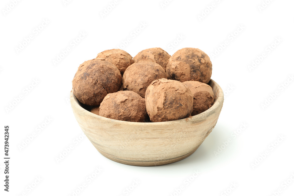 Sweet truffles in bowl isolated on white background Sweet truffles in bowl isolated on white background