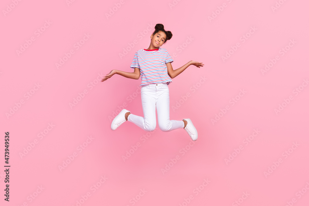 Full size photo of brown haired stylish trendy african american clueless girl wear casual clothes jump no idea isolated on pink color background