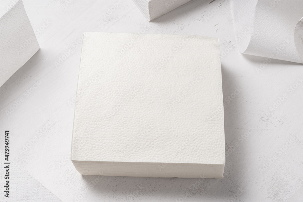 Set of different paper hand towels on wooden desk Set of different paper hand towels on wooden desk