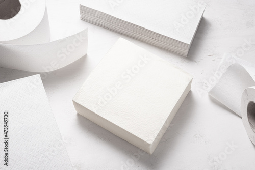 Set of different paper hand towels on wooden desk