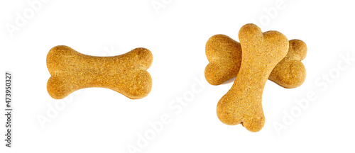 Top view of crunchy brown bone shaped dog biscuit as a treat set isolated on white background close up. photo