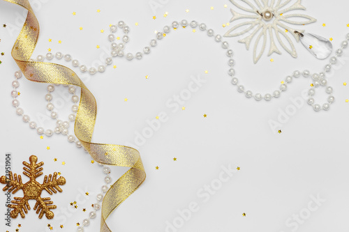 Celebratory white background with Christmas toys. Christmas background with copyspace. Holiday concept.