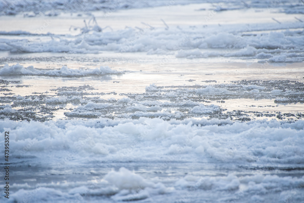 Cold winter morning, the water of the Venta river freezes, Kuldiga, Latvia