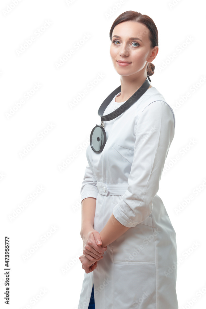 Medicine Ideas. Professional Positive Female GP Doctor Posing in Doctor's Smock and Examination Mirror Over White Background. Medicine Ideas. Professional Positive Female GP Doctor Posing in Doctor's Smock and Examination Mirror Over White Background.