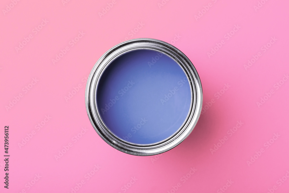 Can of very trendy 2022 color peri on pink background. Can of very trendy 2022 color peri on pink background.