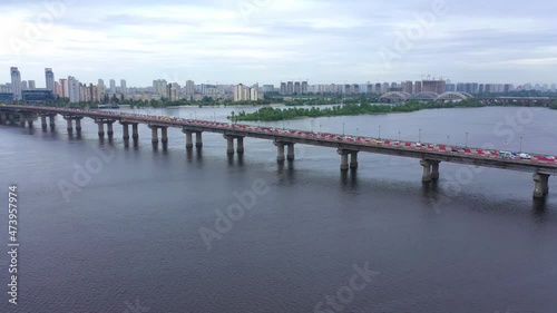 Wallpaper Mural Aerial drone footage. Big bridge with road for cars under the river. Highway in city. Torontodigital.ca