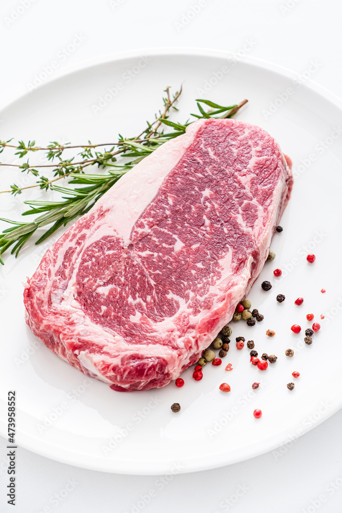 Close up beef rib eye steak isolated on white