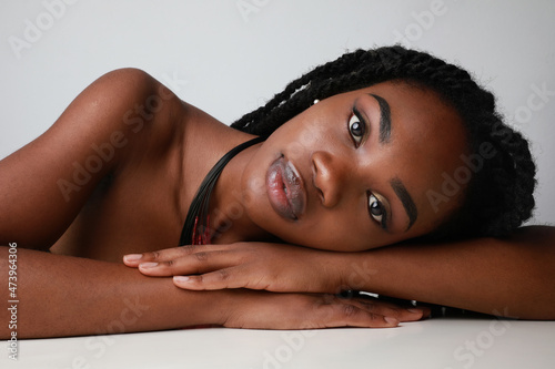 Valokuva Portrait of a confident black African young woman with braids