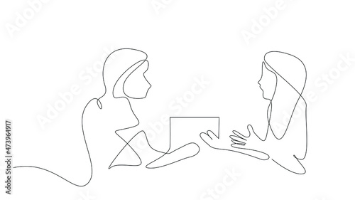 a female leader or teacher is making serious statements and saying something to the person in front of her