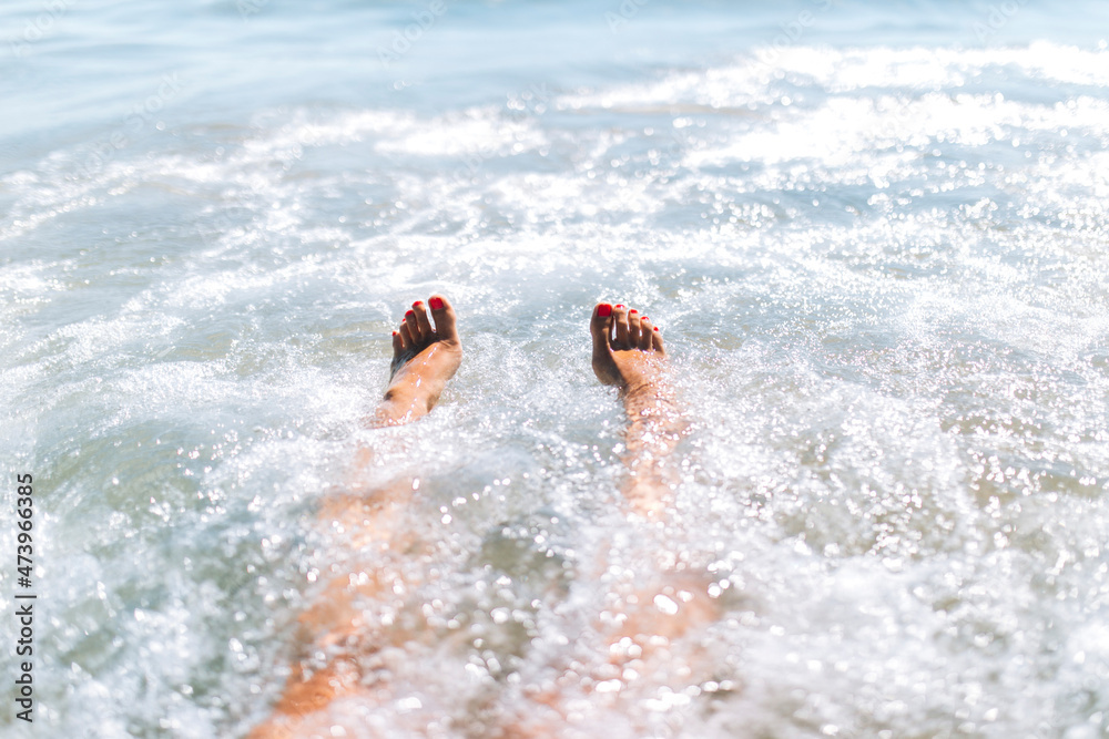 Young woman enjoying swimming in sea on sunny day Young woman enjoying swimming in sea on sunny day