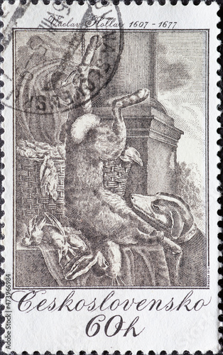 Czechoslovakia - circa 1975: A post stamp printed in Czechoslovakia showing a Still-life with Hare, by Vaclav Hollar (1649) Hunting Themes of Old Engravings. photo