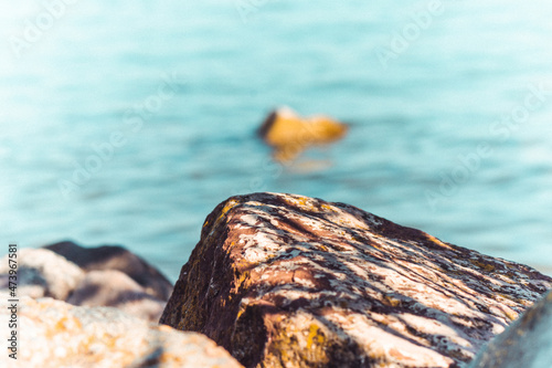 focusing on the stone by the sea