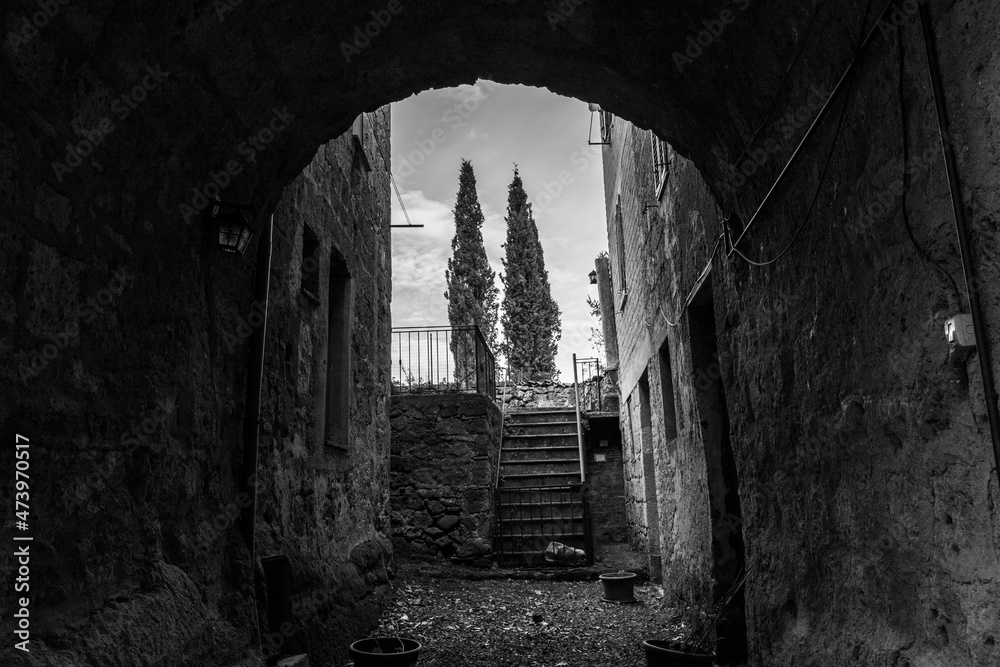 black and white image of Sovana - tuff city in Tuscany. Italy
