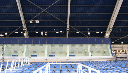 Photography Empty vip glass room on grandstand in stadium.