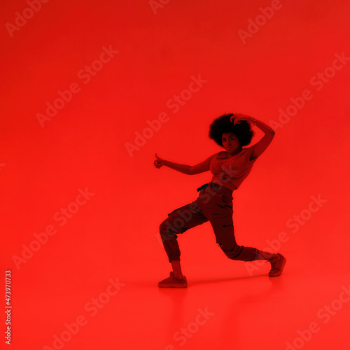 Young female dancer dancing hip hop dance