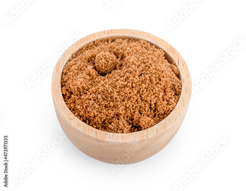 wooden bowl of brown sugar isolated on white background