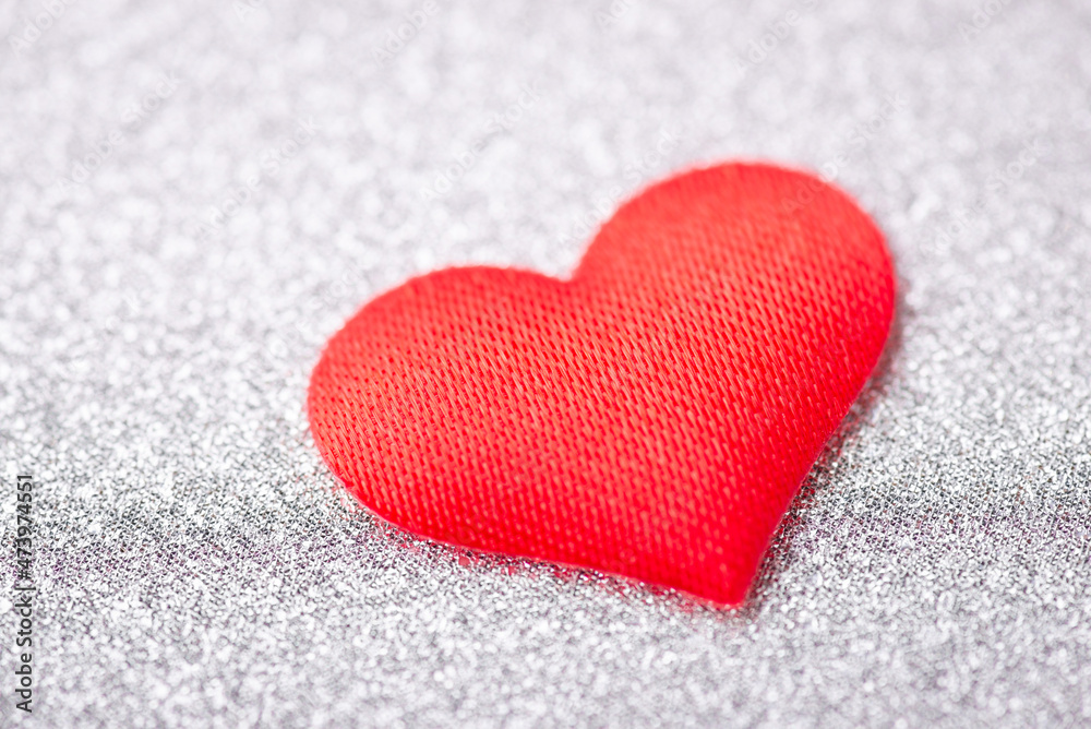 Fototapeta premium Close-up shot of a small red heart. Love concept