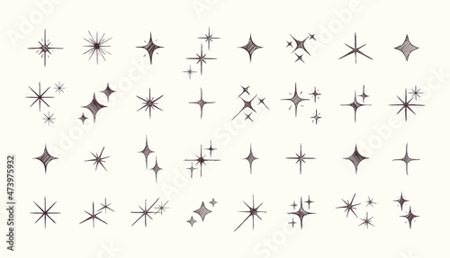 Hand drawn Sparkling star collection. Star icons. Twinkling stars. Vector Sparkles. Engraved illustration.