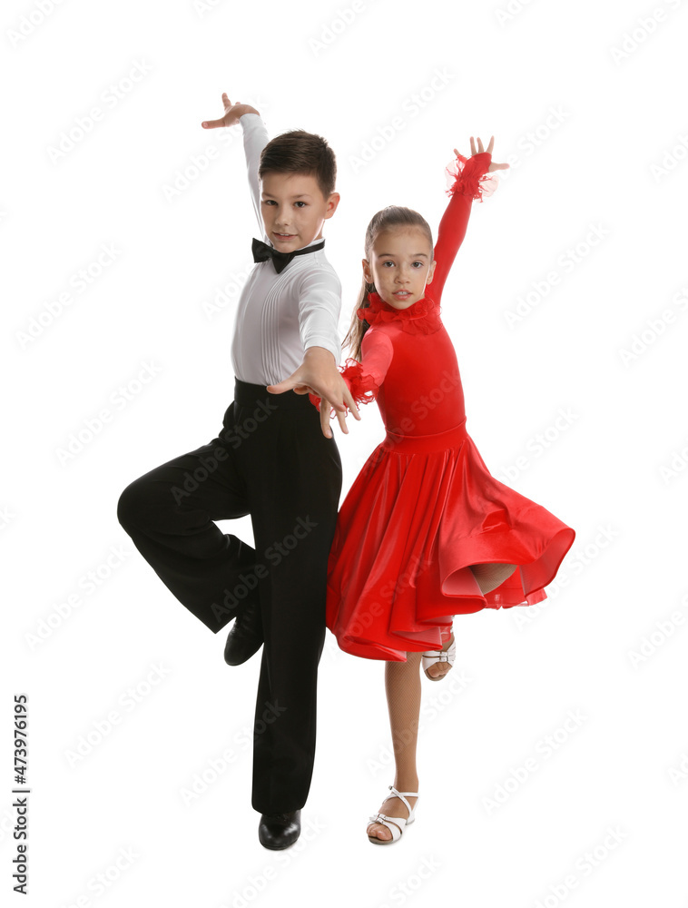 Beautifully dressed couple of kids dancing on white background Beautifully dressed couple of kids dancing on white background