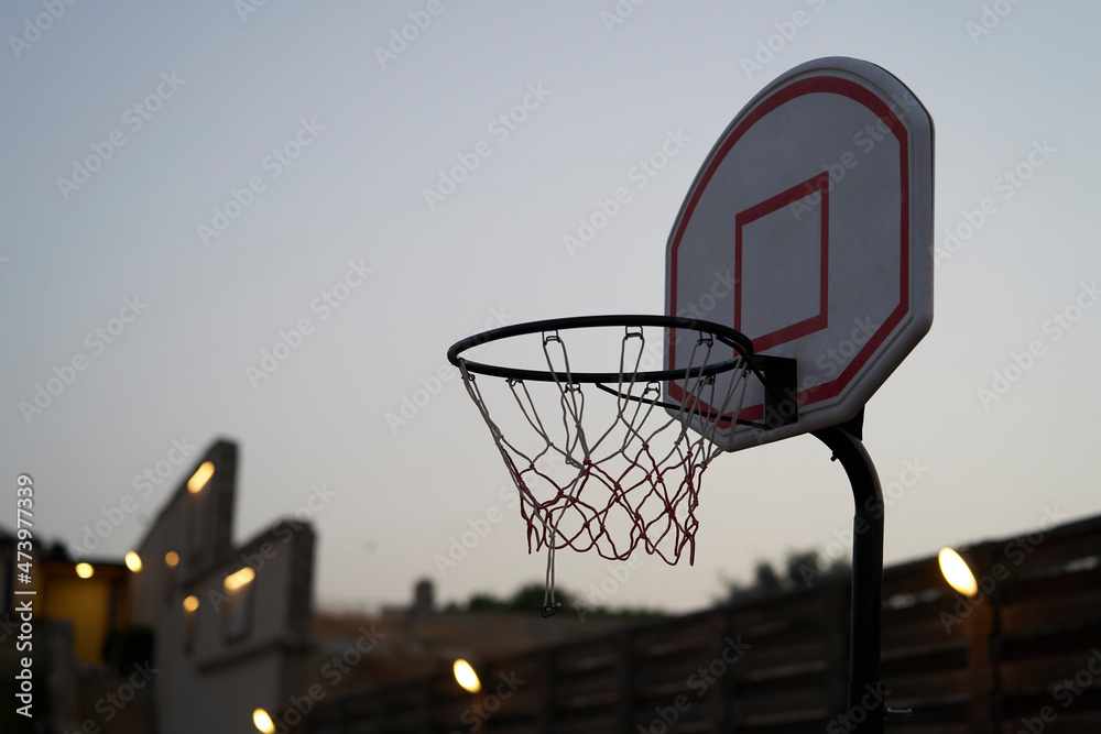 Basketball hoop at night, outdoor. Street basketball