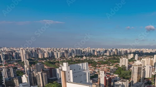 entardecer na zona sul de São Paulo, muitos prédios e nuvens . Time Lapse with clouds and sunset in Sao Paolo. timelapse . pan right photo