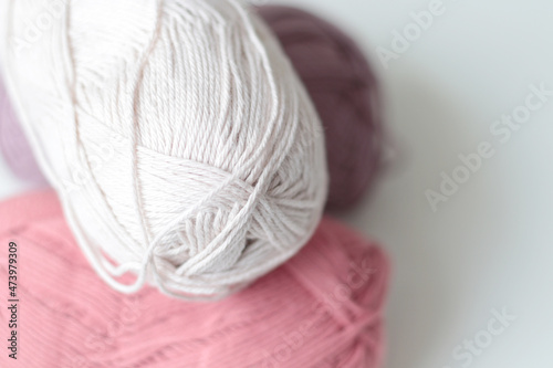 purple, red and white cotton yarn
