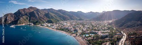 Panorama of the Turkish city of Icmeler. Aerial view of the bay, city beach and mountains © Alexey Oblov