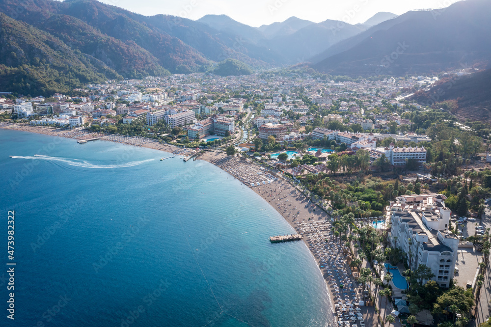 Panorama of the Turkish city of Icmeler. Aerial view of the bay, city beach and mountains