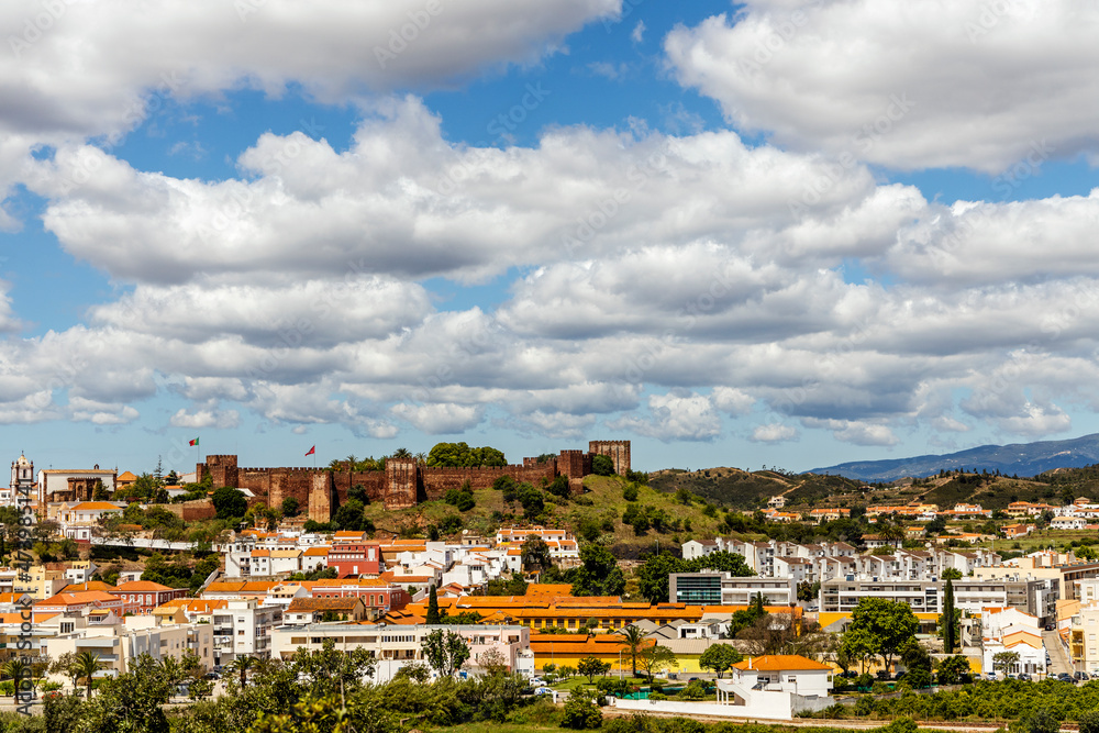 Silves cityscape with Moorish castle and cathedral in Algarve, Portugal