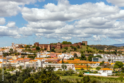 Silves cityscape with Moorish castle and cathedral in Algarve, Portugal