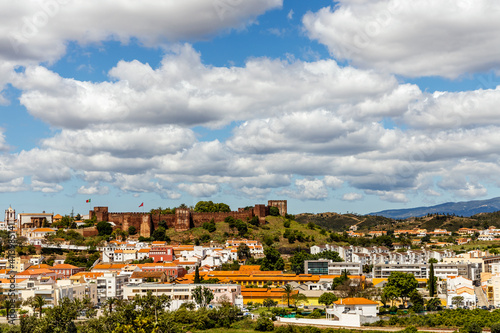 Silves cityscape with Moorish castle and cathedral in Algarve, Portugal