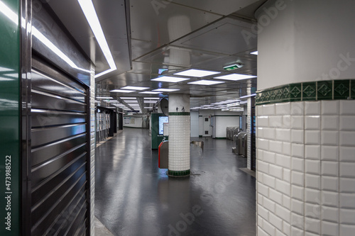 Photography Interior of an underground metro station entrance in urban Paris France