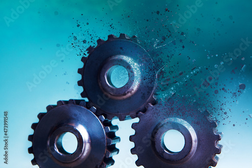 gears disappear on a blue background photo