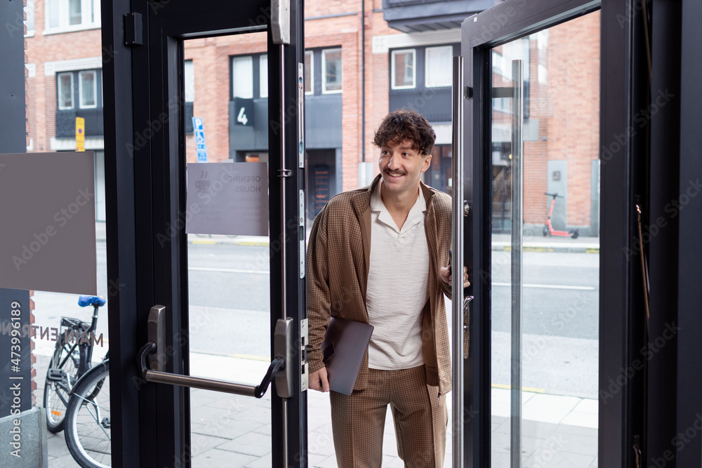 Man entering office Man entering office