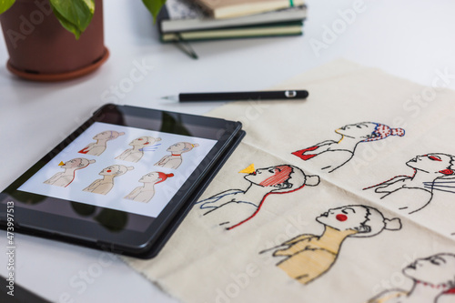 Digital tablet by textile with embroidered pattern