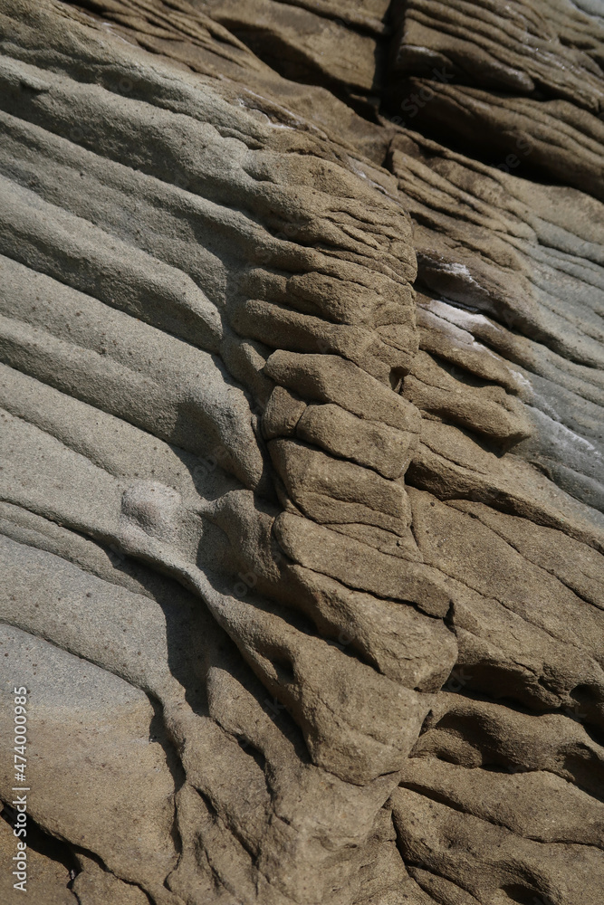texture of porous stones on the beach, nature, natural phenomena, brown-gray stones texture of porous stones on the beach, nature, natural phenomena, brown-gray stones