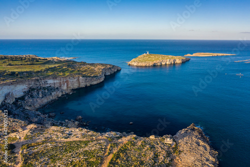 Malta, Northern District, Mellieha, Aerial view of Saint Pauls Island with clear line of horizon over Mediterranean Sea in background photo