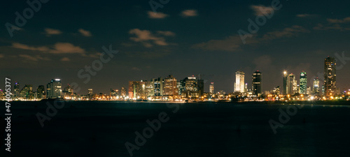 Tel Aviv city in Israel at night . Long exposure shot taken in 2013 from the sea side.